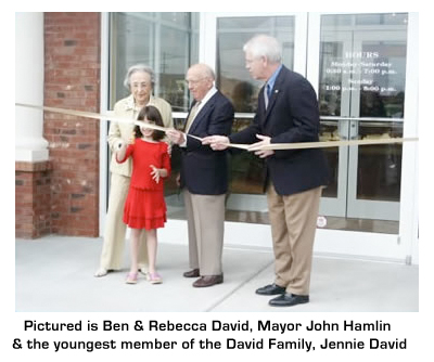 Ribbon cutting ceremony in Danville.  Pictured are Ben & Rebecca David, Mayor John Hamlin, & the Jennie David (the youngest member of the David family) cutting the ribbon.
