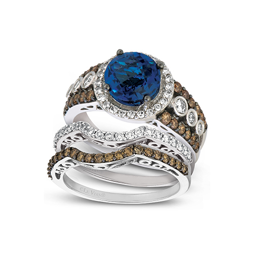 This chocolate diamond engagement ring has a center blue diamond.