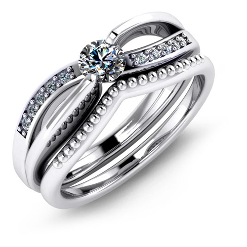 Matching engagement ring and wedding band from Malo.