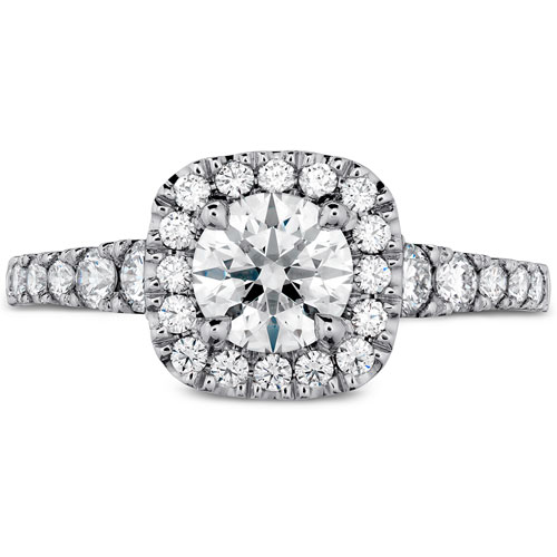 You can use a cushion diamond engagement ring setting and use a round diamond.