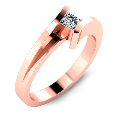 Rose gold bezel diamond engagement ring.