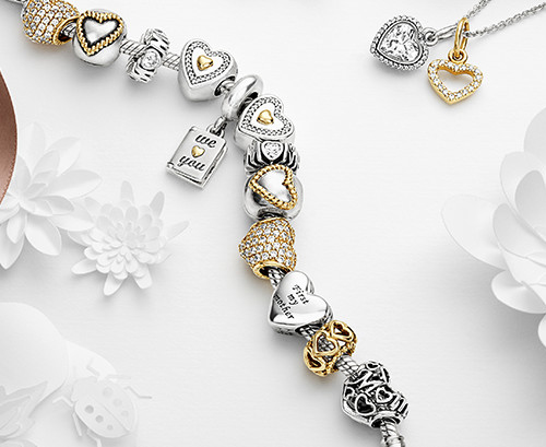 Pandora designs bracelets in sterling silver and also gold.