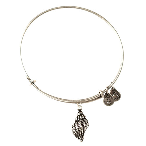 The Conch Charm bangle is available in both gold and silver.