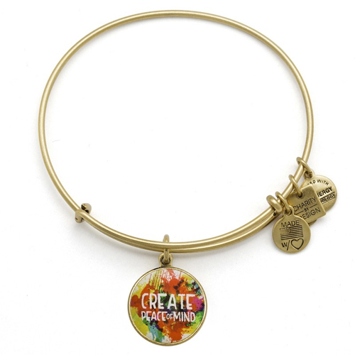 Peace bangle bracelet was designed by Alex and Ani.