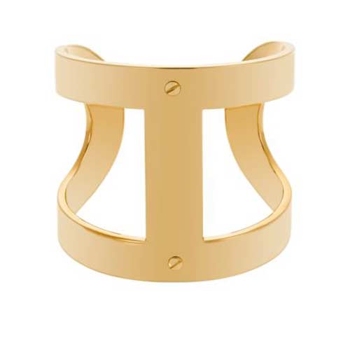 Gold cuff jewelry designed by Michael Kors.