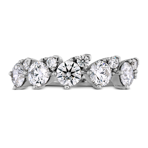 The teardrop diamond setting makes the diamonds look like pear shaped diamonds.