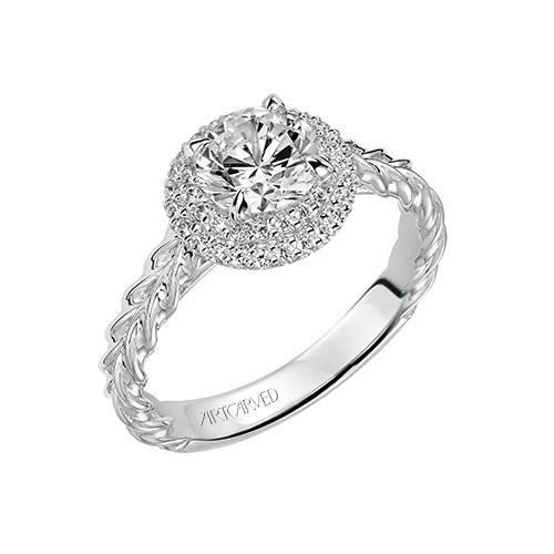 A halo engagement ring setting gives lots more sparkle to the diamonds.