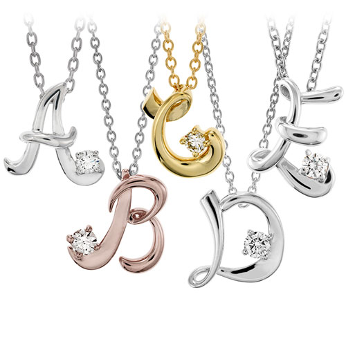 Hearts on Fire designed these initial pendants with diamonds.