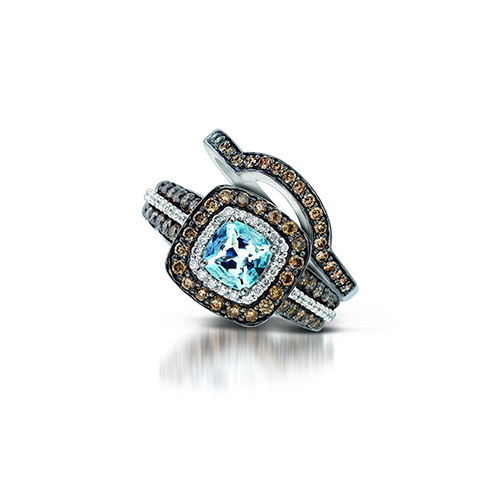 A pretty combination of chocolate diamonds, white diamonds and a blue diamond.