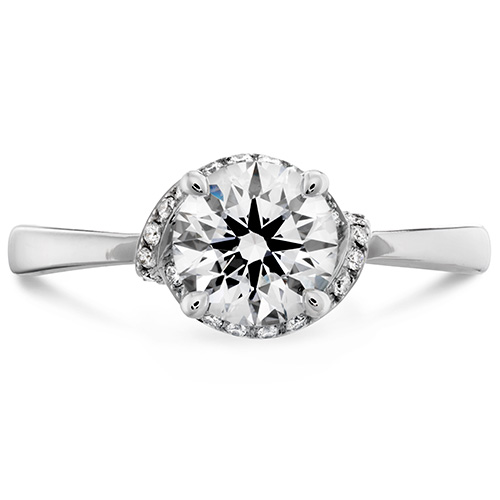 Optima feature a large center diamond, much like a solitaire and is made with white gold.