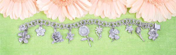 A great variety of silver charms for necklaces are available from Rembrandt.