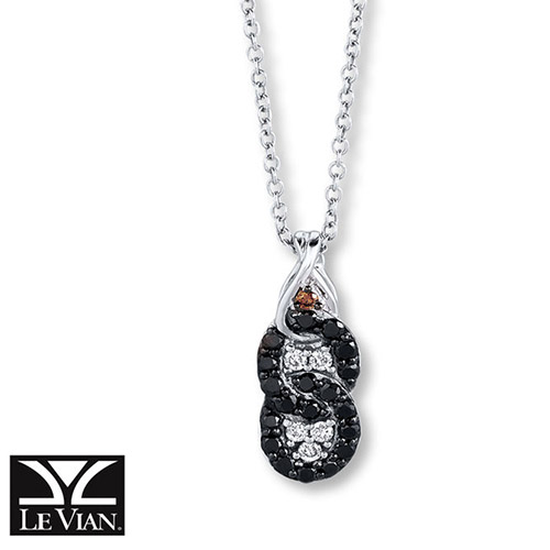 This pendant features two loops of black diamonds and white diamonds.