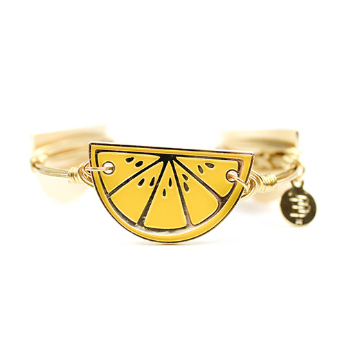 A Lemon Medallion Bangle by Bourbon and Boweties