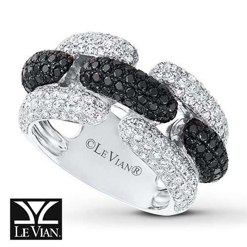 A ring featuring black diamonds and white diamonds.